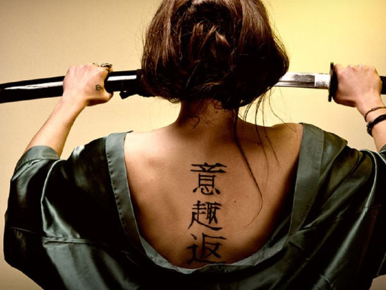 meaning-tattoo-Japanese-woman-back letters