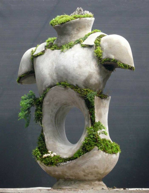 green moss garden statues