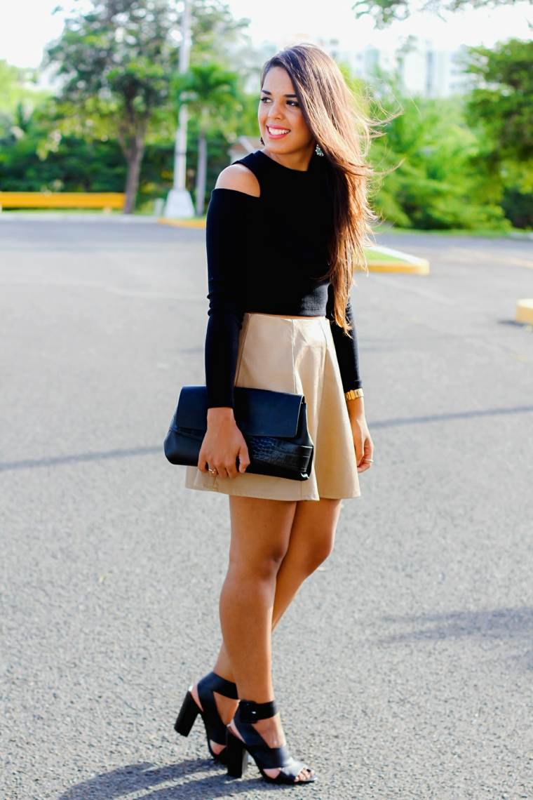 girl holding casual chic style short skirt
