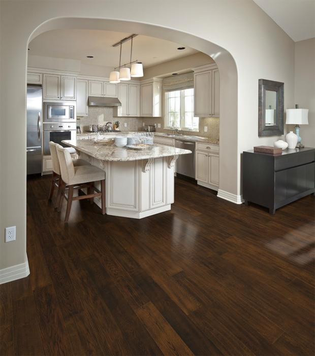 superb kitchen with a dark parquet flooring