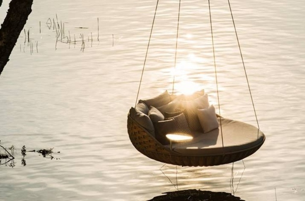 beautiful spacious hanging chair in braided resin