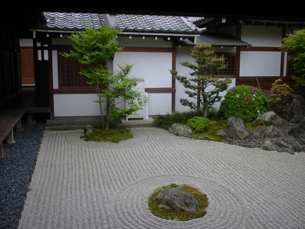 beautiful zen garden with sand past the rake