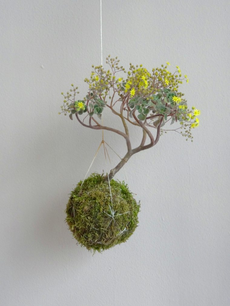 Japansk konst kokedama blommig fjädring