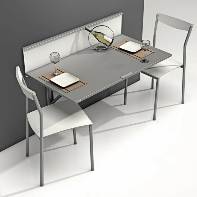 Large tables hung on gray and white walls