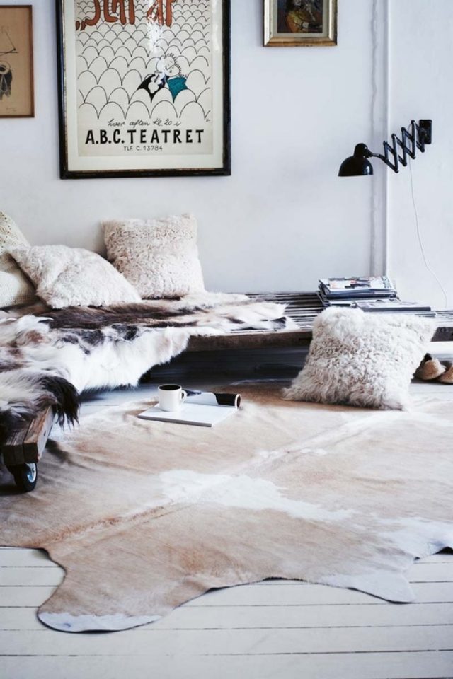 carpet-skin-cow-beige-light-white-living room-bans-down-wood-casters-cushions carpet cowhide
