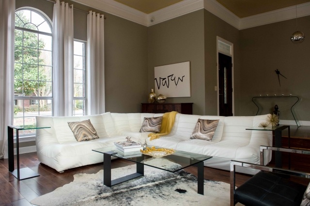 carpet-skin-cow-white-accents-black-sofa-white-living room carpet cowhide