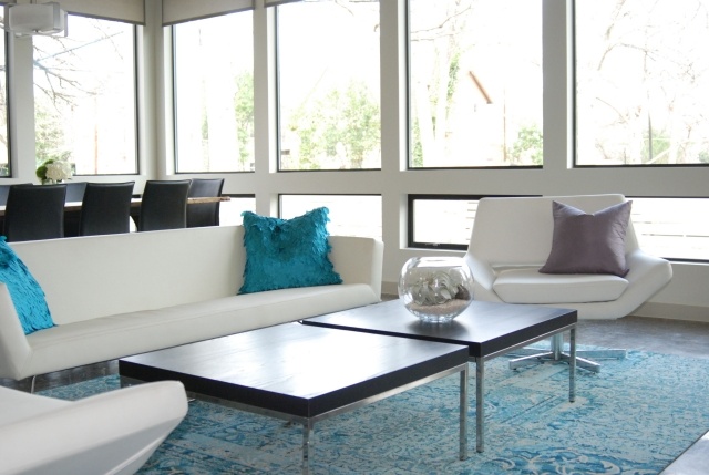 blue modern living room carpet sofa white armchairs