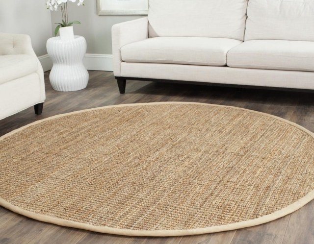 warm round sisal rug modern white living room