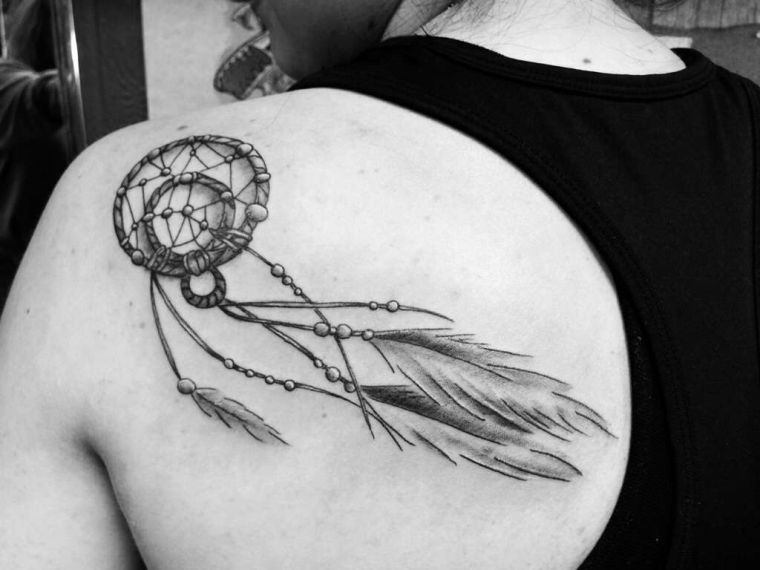 tattoo catches dream back-woman-black