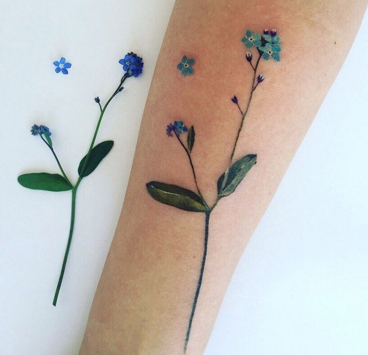 tattoo arm woman flower delicat art design tattoo