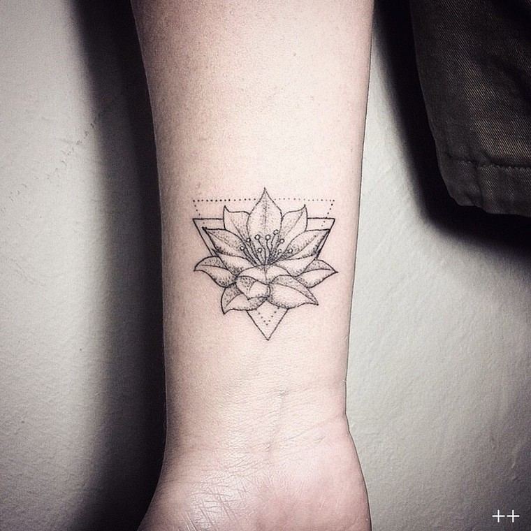 tattoo arm-woman-delicate lotus