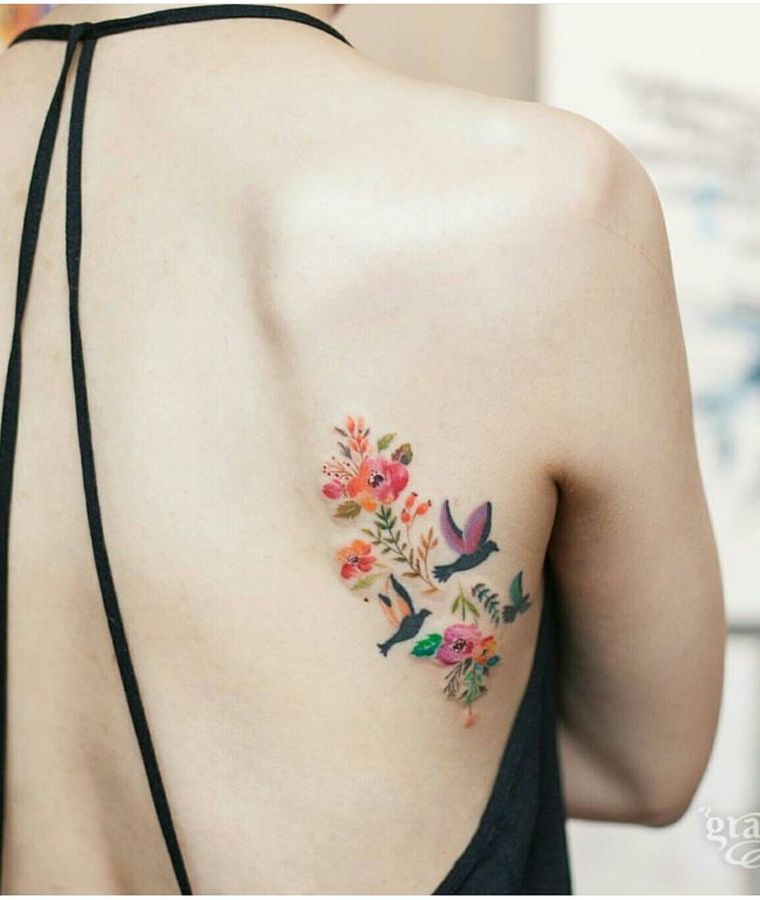 tattoo bird colors-back-woman-model