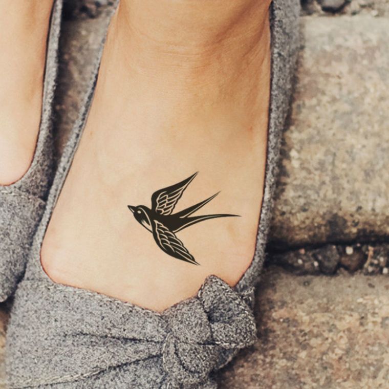 tattoo bird swallow-foot-woman-small-tattoos