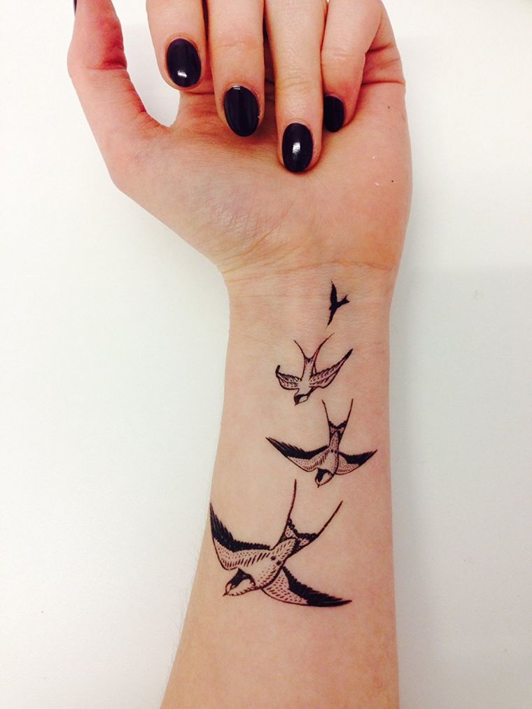 tattoo bird silhouette-wrist-woman-meaning
