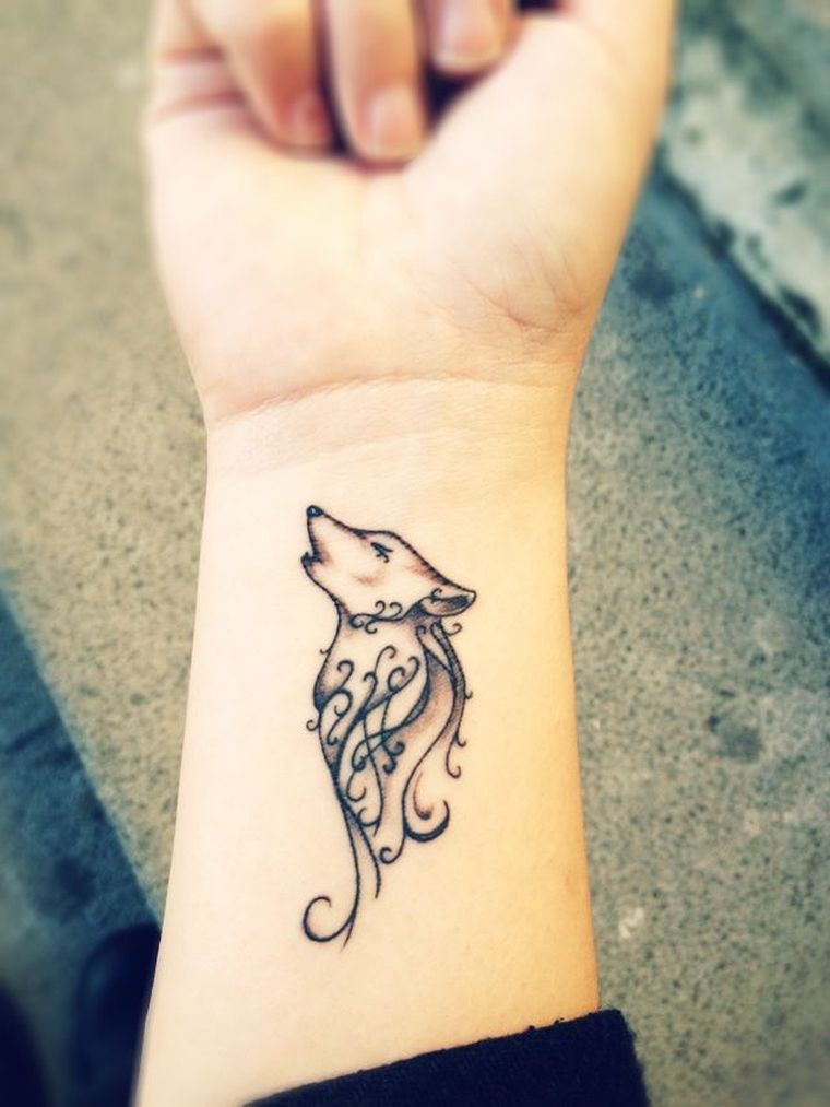 tribal tattoo wolf-woman-idea-hand