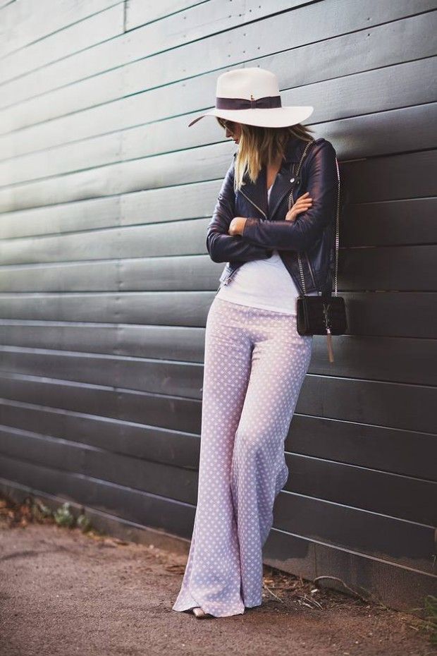 woman outfit modern pants pink peas hat leather jacket