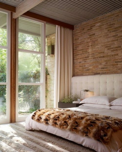 head white bed wall bricks clear room