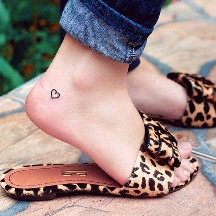 toddler-tattoo-foot-heart woman