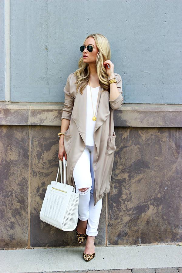 woman look trend idea holding jacket pants white white leather bag