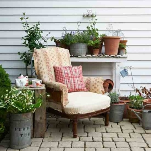 comfortable chair view terrace floor stones