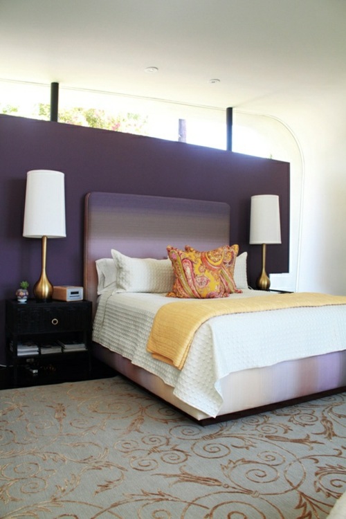 comfortable bed view purple room